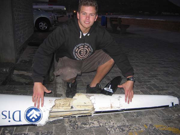 Lyle Maasdorp shows the damage to his surf ski