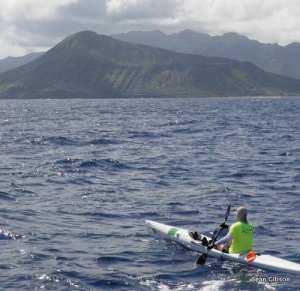 Sean Gibson approaches Oahu at the end of a long, hot paddle!