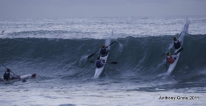 The paddlers set out through the surf at Scottburgh at dawn