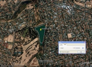 Yes, that really is the venue.  And no, I couldn't find any other photos of surfskis on Emmerentia Dam!