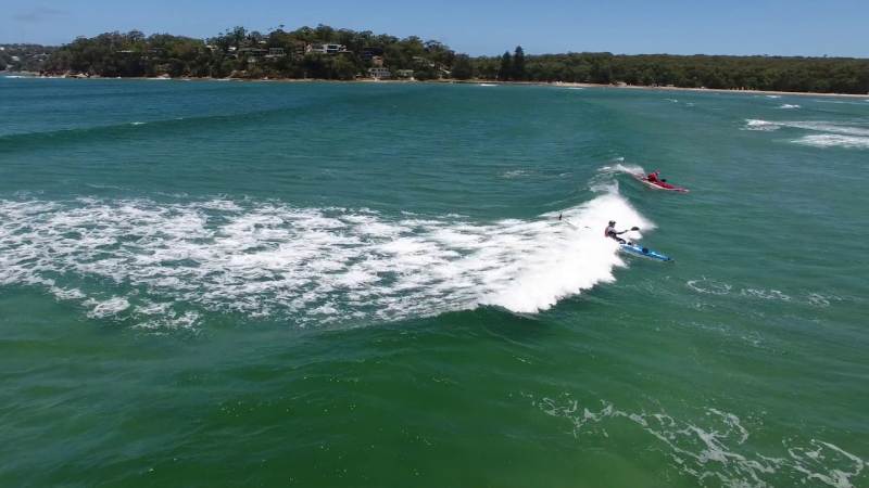 Sea Kayaks raging on the Bundeena Bar, Australia