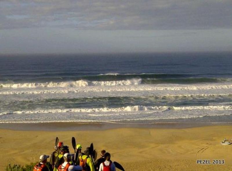 The paddlers contemplate the surf at the start of day 2